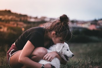 Girl Hugging And Kissing Dog 