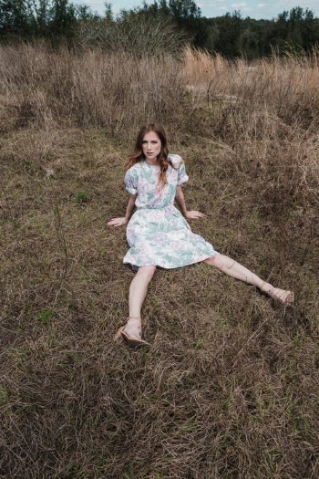 Girl in Blue Dress Sitting on Green Grass · Free Stock Photo
