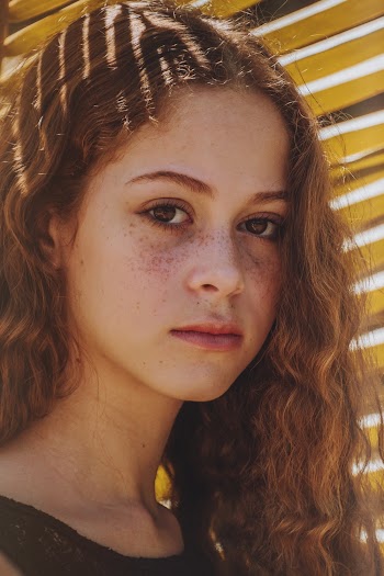 Girl in Brown Tank Top