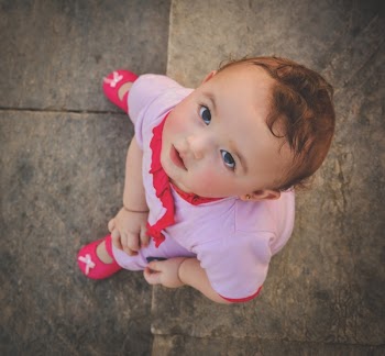 Girl in Pink and Red Shirt and Pants