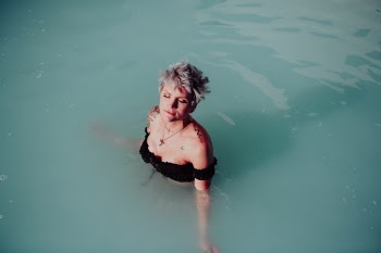 Girl in the Blue Lagoon in Reykavik Iceland 