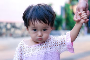Girl in White Lace Shirt on Selective Focus Photography