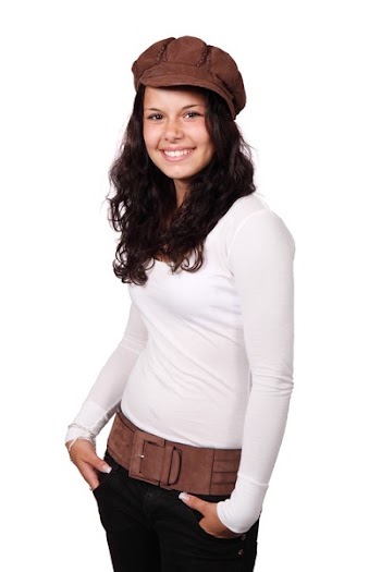 Girl in White Long Sleeve Shirt Wearing Brown Beret