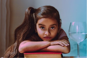 Girl Leaning On Book