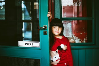 Girl Leaning on Door