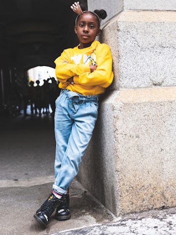 Girl Leaning Sideways on Wall