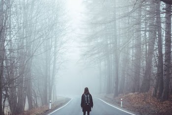 girl on the middle of the road
