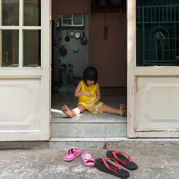 Girl Sitting on Floor