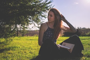 Girl sitting on the grass