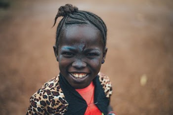 girl smiling in front of camera