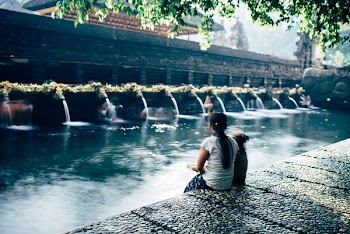 Girl Viewing Buddhist Temple