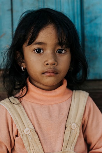 Girl Wearing Beige Vest
