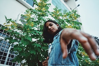 Girl Wearing Blue Denim Vest