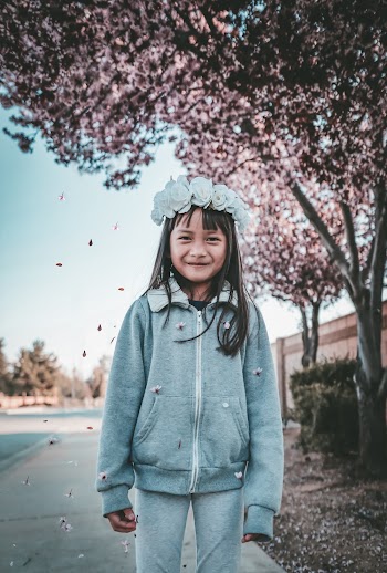 Girl Wearing Gray Zip-up Hoodie and Pants With Flower Tiara