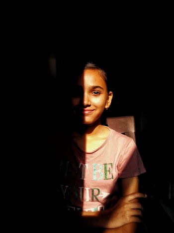 Girl Wearing Pink and Green Crew-neck T-shirt