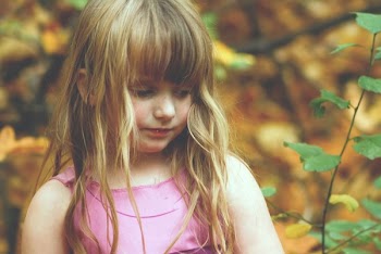 Girl Wearing Pink Sleeveless Dress