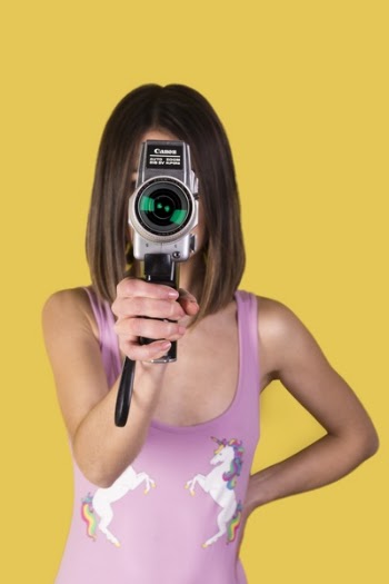 Girl Wearing Purple Tank Top Holding Canon Camera