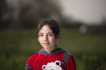 Girl Wearing Red and Black Hoodie