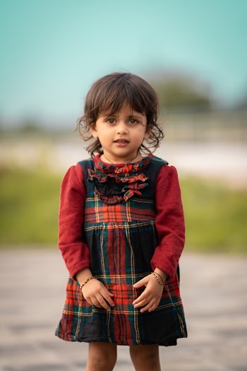Girl Wearing Red and Black Long-sleeved Dress