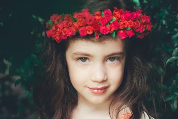 Girl Wearing Red Flower Headband