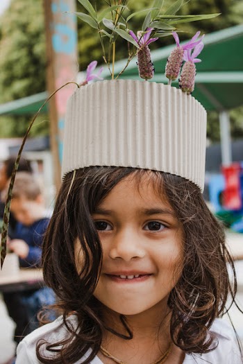 Girl Wearing Round Gray Floral Headdress