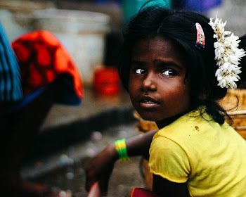 girl wearing white flower hair band