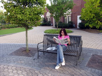 girlreadingnewspaper.jpg