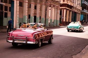Girls Riding on Red Convertible Coupe