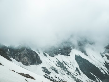Glacier Mountain Surrounded by Fogs