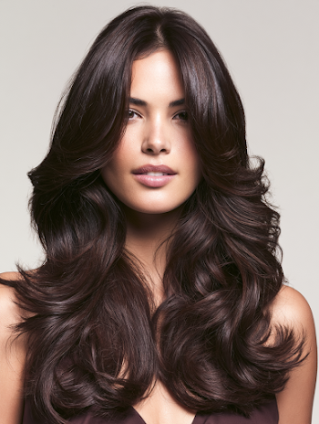 Glamorous Long Hair with Deep Side Part and Soft Waves