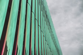 Glass Building Reflects Blue
