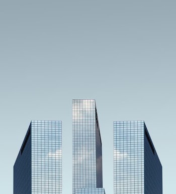 glass buildings under blue sky