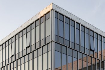 Glass-covered Building Day Daytime