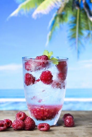 Glass Cup With Raspberry Inside and Outside