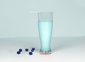 Glass of Milk Against White Background