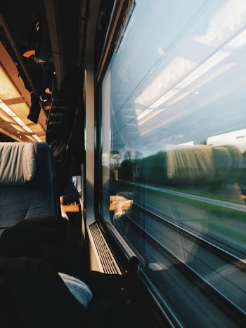 Glass Transportation Window With Chairs