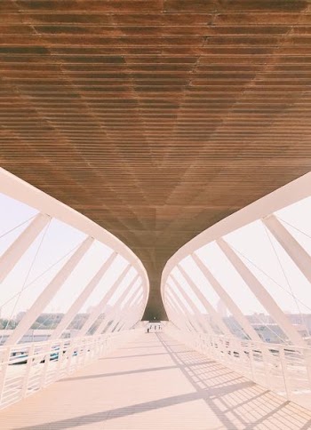 glass walls and brown roof