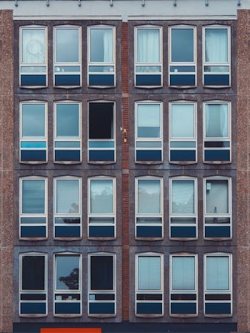 glass windows on brown building