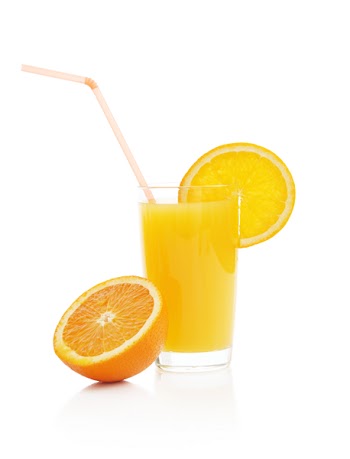 Glass with orange juice on a white background