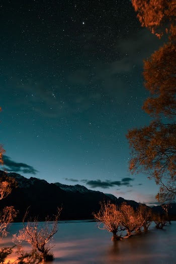 Glenorchy lake area just after sunset. It was tricky taking this as it was pitch black, but lucky enough that the stars were sharp. 