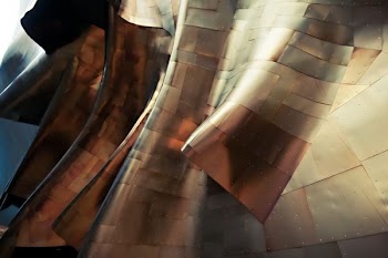 Glossy sheets of metal form abstract shapes in the Experience Music Project Museum