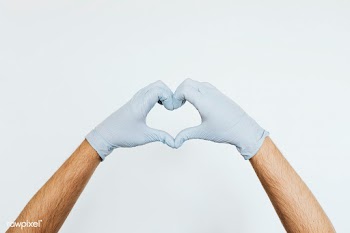 Gloved hands making a heart shaped sign on a gray background | Free  photo - 2350872