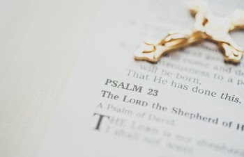 gold-colored crucifix