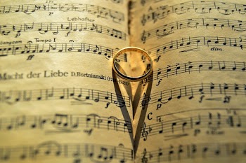 Gold-colored Ring on Musical Note