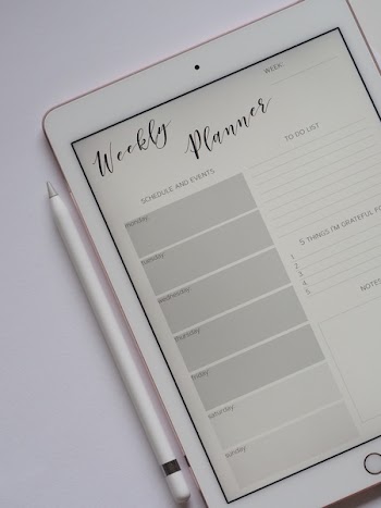 Gold Ipad Beside Stylus