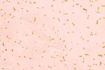 Golden confetti on a marble textured background