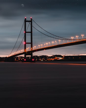 Golden Gate Bridge Under Cloudy Sky