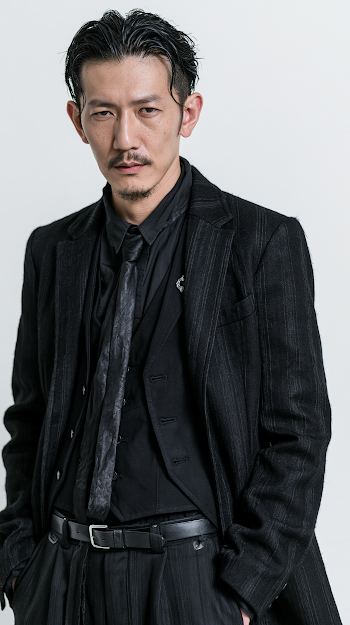 Gothic Rock Gentleman in Tailored Black Suit