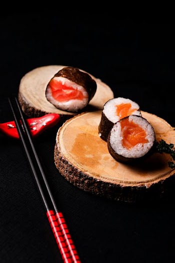 Gourmet Sushi Rolls on Wooden Platter