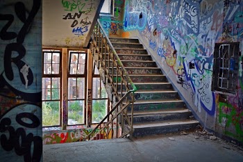 Graffiti Wall With Wrought Iron Donwstairs